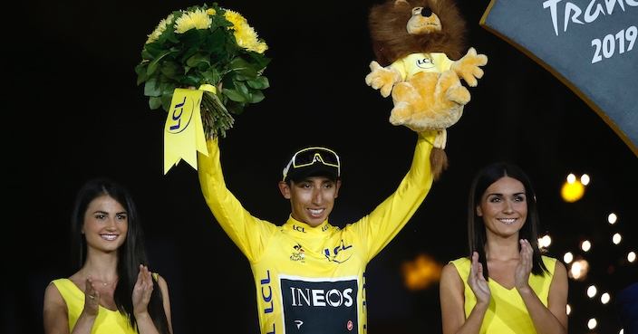 Colombia's Egan Bernal stands on the podium after winning the 2019 Tour de France cycling race in Paris, France, Sunday, July 28, 2019. (AP Photo/Michel Euler)