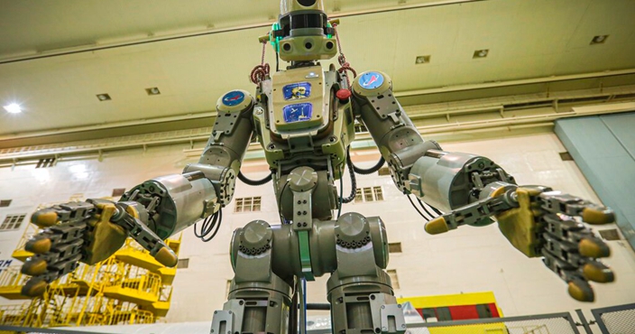 In this photo taken on Friday, July 26, 2019, and distributed by Roscosmos Space Agency Press Service, the Fedor robot is seen before being loaded into  a Soyuz capsule to be launched by a new Soyuz 2.1a rocket from the launch pad at Russia’s space facility in Baikonur, Kazakhstan.  The new Russian rocket, that is expected to replace the current model sending manned missions into space, blasted off Thursday, carrying a Soyuz capsule with a humanoid robot that will be tested in spaceflight conditions aboard the International Space Station (ISS).  (Roscosmos Space Agency Press Service photo via AP)