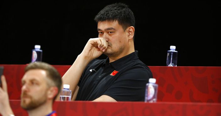 Yao Ming, head of the Chinese Basketball Association and former NBA player, watches as China and Venezeula compete during their group phase basketball game in the FIBA Basketball World Cup at the Cadillac Arena in Beijing, Wednesday, Sept. 4, 2019. (AP Photo/Mark Schiefelbein)