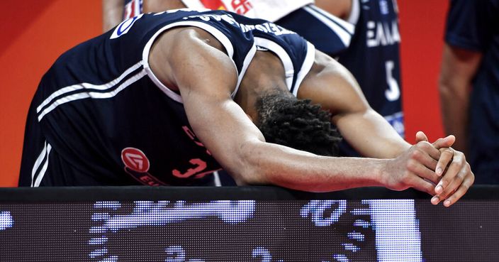 In this photo released by Xinhua News Agency, Giannis Antetokounmpo of Greece reacts during their second round game against Czech Republic in the FIBA Basketball World Cup in Shenzhen in southern China's Guangdong province, Monday, Sept. 9, 2019. (Xu Chang/Xinhua via AP)