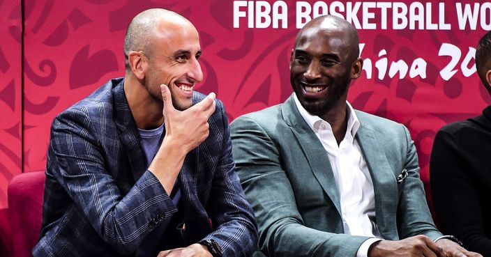 BEIJING, CHINA - SEPTEMBER 13:  Kobe Bryant and Manu Ginobilid talk to each other during the semi final march between Argentina and France of 2019 FIBA World Cup at the Cadillac Arena on September 13, 2019 in Beijing, China.  (Photo by Di Yin/Getty Images)