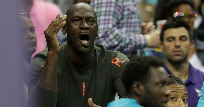 CHARLOTTE, NC - OCTOBER 13:  Michael Jordan, owner of the Charlotte Hornets reacts on the bench during their game against the Dallas Mavericks at Spectrum Center on October 13, 2017 in Charlotte, North Carolina.  NOTE TO USER: User expressly acknowledges and agrees that, by downloading and or using this photograph, User is consenting to the terms and conditions of the Getty Images License Agreement.  (Photo by Streeter Lecka/Getty Images)