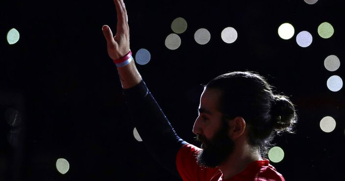 Ricky Rubio of Spain stands during team introductions before their first-place match against Argentina in the FIBA Basketball World Cup at the Cadillac Arena in Beijing, Sunday, Sept. 15, 2019. (AP Photo/Mark Schiefelbein)