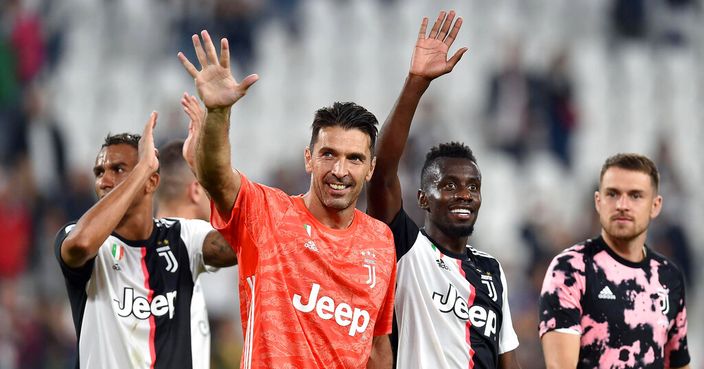 Juventus' goalkeeper Gianluigi Buffon salutes supporters at the end of the Italian Serie A soccer match between Juventus and Verona at the Juventus' Stadium in Turin, Italy, Saturday, Sept. 21, 2019. (Alessandro Di Marco/ANSA via AP)