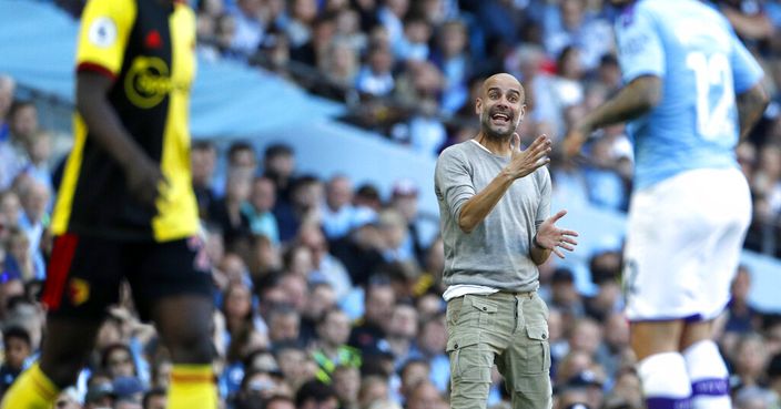 Manchester City's head coach Pep Guardiola grimaces during the English Premier League soccer match between Manchester City and Watford at Etihad stadium in Manchester, England, Saturday, Sept. 21, 2019. (AP Photo/Rui Vieira)