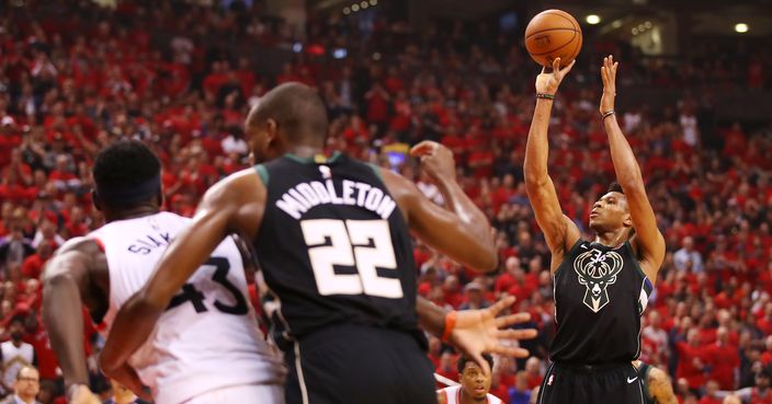 TORONTO, ONTARIO - MAY 25: Giannis Antetokounmpo #34 of the Milwaukee Bucks shoots a free throw during the first half against the Toronto Raptors in game six of the NBA Eastern Conference Finals at Scotiabank Arena on May 25, 2019 in Toronto, Canada. NOTE TO USER: User expressly acknowledges and agrees that, by downloading and or using this photograph, User is consenting to the terms and conditions of the Getty Images License Agreement. (Photo by Gregory Shamus/Getty Images)