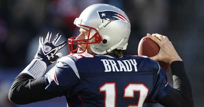 New England Patriots quarterback Tom Brady (12) in the first half of an NFL football game against the Miami Dolphins in Foxborough, Mass., Saturday Dec. 24, 2011. (AP Photo/Charles Krupa)