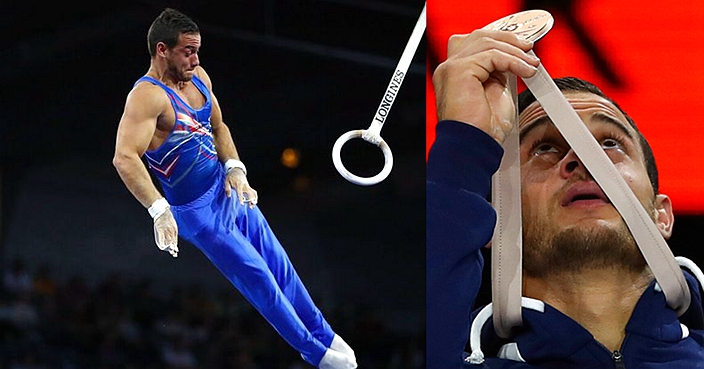 Bronze medalist Samir Ait Said of France performs on the rings in the men's apparatus finals at the Gymnastics World Championships in Stuttgart, Germany, Saturday, Oct. 12, 2019. (AP Photo/Matthias Schrader)