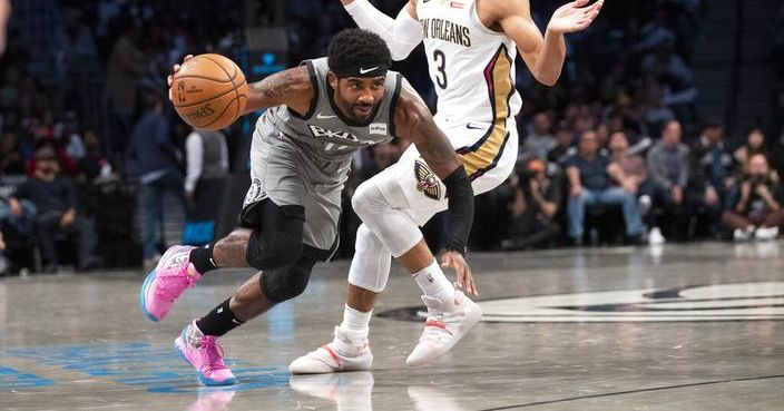 Brooklyn Nets guard Kyrie Irving (11) drives to the basket against New Orleans Pelicans guard Josh Hart (3) during the second half of an NBA basketball game, Monday, Nov. 4, 2019, in New York. (AP Photo/Mary Altaffer)
