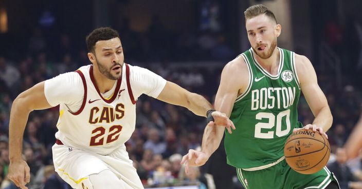 Boston Celtics' Gordon Hayward (20) drives past Cleveland Cavaliers' Larry Nance Jr. (22) in the first half of an NBA basketball game, Tuesday, Nov. 5, 2019, in Cleveland. (AP Photo/Tony Dejak)