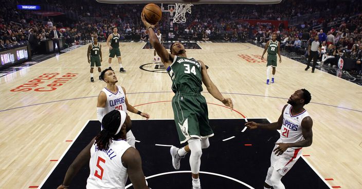 Milwaukee Bucks' Giannis Antetokounmpo (34) shoots against the Los Angeles Clippers during the first half of an NBA basketball game, Wednesday, Nov. 6, 2019, in Los Angeles. (AP Photo/Marcio Jose Sanchez)
