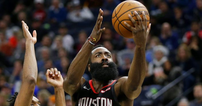 Houston Rockets guard James Harden (13) shoots on against Minnesota Timberwolves guard Keita Bates-Diop in the third quarter during an NBA basketball game Saturday, Nov. 16, 2019 in Minneapolis. The Rockets defeated the Timberwolves 125-105 with Harden scoring a game-high 49 points. (AP Photo/Andy Clayton- King)