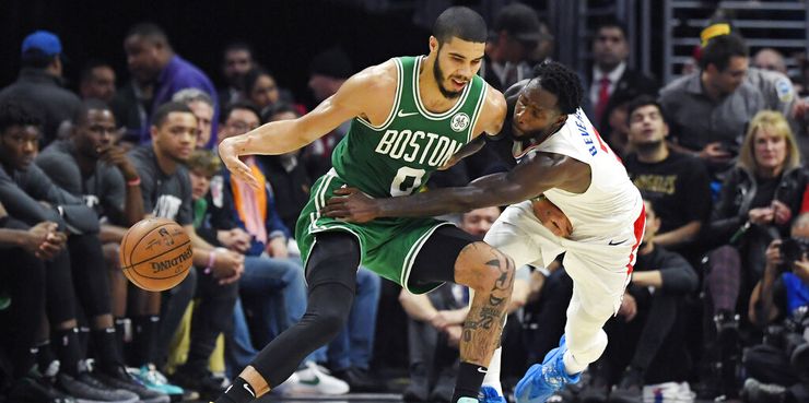 Los Angeles Clippers guard Patrick Beverley, right, reaches in on Boston Celtics forward Jayson Tatum during the second half of an NBA basketball game Wednesday, Nov. 20, 2019, in Los Angeles. (AP Photo/Mark J. Terrill)
