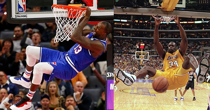 Sacramento Kings center Dewayne Dedmon, right, hangs from the rim after dunking next to Utah Jazz center Rudy Gobert during the second half of an NBA basketball game in Sacramento, Calif., Friday, Nov. 1, 2019. The Kings won 102-101. (AP Photo/Rich Pedroncelli)