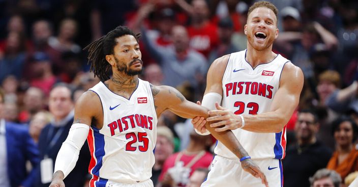 Detroit Pistons guard Derrick Rose (25) celebrates the game winning score with forward Blake Griffin (23) in the second half of an NBA basketball game in New Orleans, Monday, Dec. 9, 2019. (AP Photo/Brett Duke)