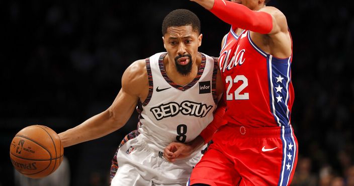 Brooklyn Nets guard Spencer Dinwiddie (8) drives to the basket as Philadelphia 76ers guard Matisse Thybulle (22) defends against him during the second quarter of an NBA basketball game at Barclays Center, Sunday, Dec. 15, 2019, in New York. (AP Photo/Michael Owens)