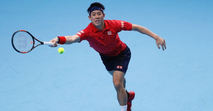 Kei Nishikori of Japan plays a return to Marin Cilic of Croatia during their ATP World Tour Finals singles tennis match at the O2 Arena in London, Friday, Nov. 18, 2016. (AP Photo/Kirsty Wigglesworth)