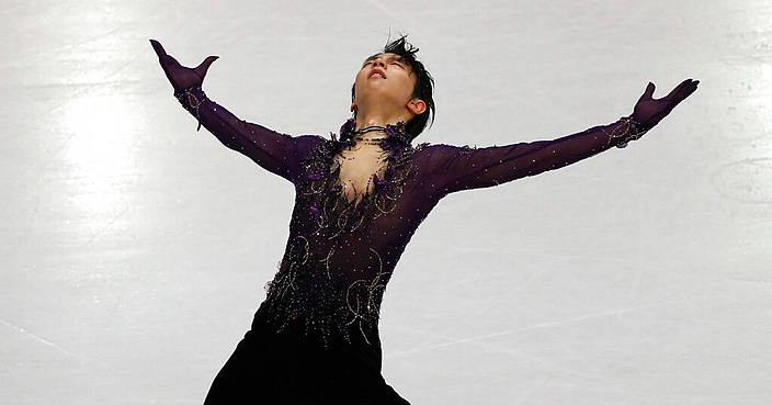 Japan's Yuzuru Hanyu competes in the men's free skating during the figure skating Grand Prix finals at the Palavela ice arena, in Turin, Italy, Saturday, Dec. 7, 2019. (AP Photo/Antonio Calanni)
