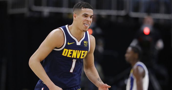 Denver Nuggets' Michael Porter Jr. reacts during the second half of the team's NBA basketball game against the Indiana Pacers, Thursday, Jan. 2, 2020, in Indianapolis. Denver won 124-116. (AP Photo/Darron Cummings)
