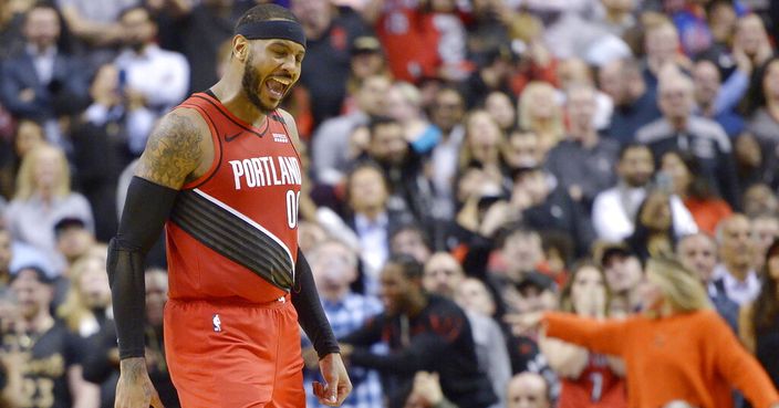 Portland Trail Blazers forward Carmelo Anthony (00) reacts after sinking a go-ahead basket against the Toronto Raptors during the second half of an NBA basketball game Tuesday, Jan. 7, 2020, in Toronto. (Nathan Denette/The Canadian Press via AP)