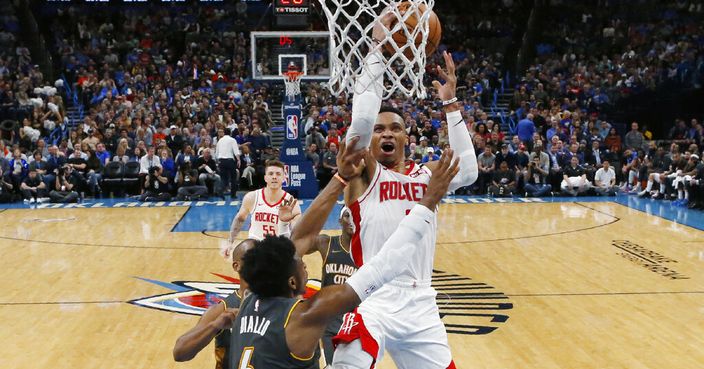 Houston Rockets guard Russell Westbrook shoots in front of Oklahoma City Thunder guard Hamidou Diallo (6) during the second half of an NBA basketball game Thursday, Jan. 9, 2020, in Oklahoma City. (AP Photo/Sue Ogrocki)