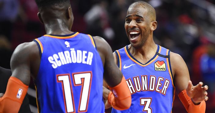 Oklahoma City Thunder guard Chris Paul (3) celebrates the team's win with guard Dennis Schroder in an NBA basketball game against the Houston Rockets, Monday, Jan. 20, 2020, in Houston. (AP Photo/Eric Christian Smith)