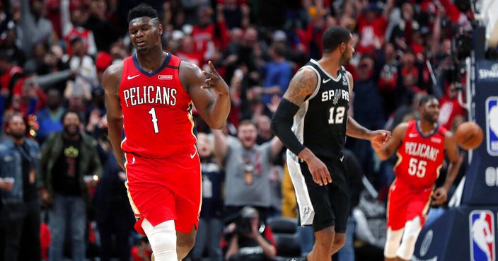 New Orleans Pelicans forward Zion Williamson (1) reacts after making a 3-point basket in the second half of an NBA basketball game against the San Antonio Spurs in New Orleans, Wednesday, Jan. 22, 2020. The Spurs won 121-117. (AP Photo/Gerald Herbert)