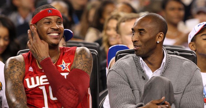 ARLINGTON, TX - FEBRUARY 14:  (L-R) Carmelo Anthony #15 and Kobe Bryant #24 of the Western Conference share a laugh during the NBA All-Star Game, part of 2010 NBA All-Star Weekend at Cowboys Stadium on February 14, 2010 in Arlington, Texas. The Eastern Conference defeated the Western Conference 141-139 in regulation. NOTE TO USER: User expressly acknowledges and agrees that, by downloading and or using this photograph, User is consenting to the terms and conditions of the Getty Images License Agreement.  (Photo by Jed Jacobsohn/Getty Images)