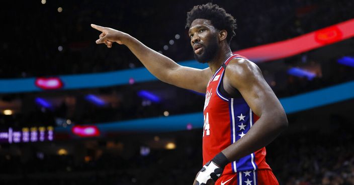Philadelphia 76ers' Joel Embiid reacts after a shot during the second half of the team's NBA basketball game against the Golden State Warriors, Tuesday, Jan. 28, 2020, in Philadelphia. (AP Photo/Matt Slocum)