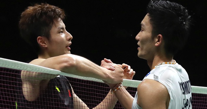 Kento Momota of Japan, right, talks with Shi Yuqi of China after beating him in their men's badminton championship match at the BWF World Championships in Nanjing, China, Sunday, Aug. 5, 2018. (AP Photo/Mark Schiefelbein)