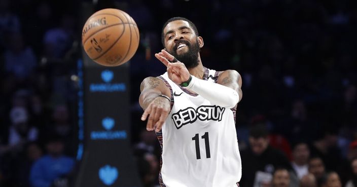 Brooklyn Nets' Kyrie Irving (11) passes the ball during the second half of the team's NBA basketball game against the Chicago Bulls on Friday, Jan. 31, 2020, in New York. The Nets won 133-118. (AP Photo/Frank Franklin II)