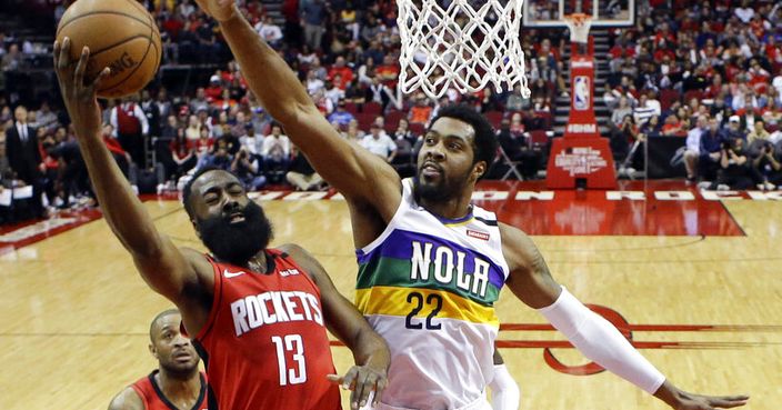 Houston Rockets guard James Harden (13) shoots as New Orleans Pelicans center Derrick Favors defends during the first half of an NBA basketball game, Sunday, Feb. 2, 2020, in Houston. (AP Photo/Eric Christian Smith)