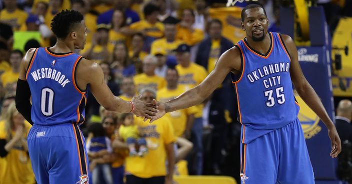 OAKLAND, CA - MAY 26:  Russell Westbrook #0 and Kevin Durant #35 of the Oklahoma City Thunder celebrate after a play against the Golden State Warriors during Game Five of the Western Conference Finals during the 2016 NBA Playoffs at ORACLE Arena on May 26, 2016 in Oakland, California.  (Photo by Ezra Shaw/Getty Images)