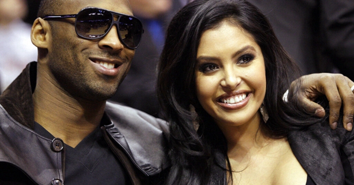 FILE - In this Feb. 13, 2010, file photo, Los Angeles Lakers guard Kobe Bryant and his wife, Vanessa, attend the skills competition at the NBA basketball All-Star Saturday Night in Dallas. Vanessa Bryant expressed grief and anger in an Instagram post Monday, Feb. 10, 2020, as she copes with the deaths of her husband Kobe Bryant, their daughter Gigi and seven other people in a helicopter crash last month. (AP Photo/LM Otero, File)
