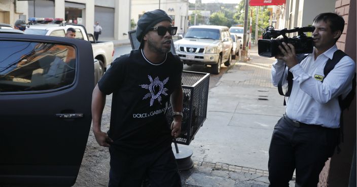 Brazil’s soccer star “Ronaldinho”, or Ronaldo de Assis Moreira, enters to Paraguay’s attorney offices in Asuncion, Paraguay, Thursday, March 5, 2020. According to local news Ronaldinho is accused of arrived to the country with a fake Paraguay Passport. (AP Photo/Jorge Saenz)