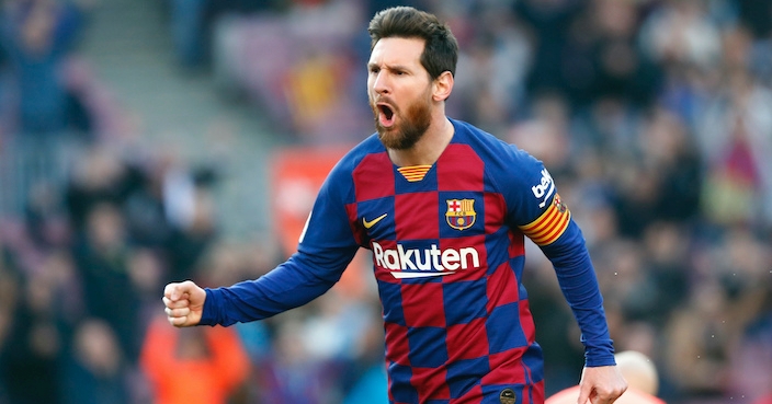 Barcelona's Lionel Messi celebrates after scoring his side's opening goal during a Spanish La Liga soccer match between Barcelona and Eibar at the Camp Nou stadium in Barcelona, Spain, Saturday Feb. 22, 2020. (AP Photo/Joan Monfort)